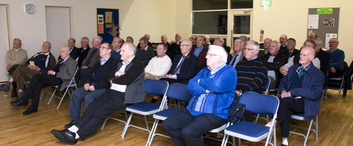 Members listen to the talk